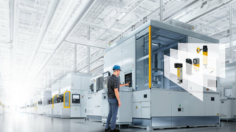 Production staff in front of a machine with Pilz safety locking devices