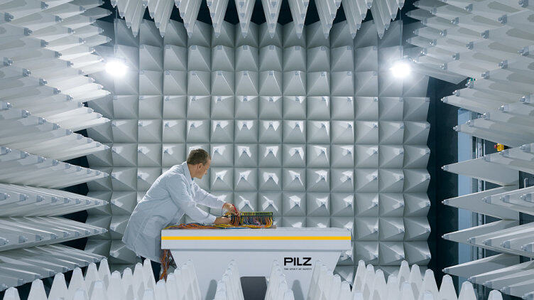 A man in a white laboratory