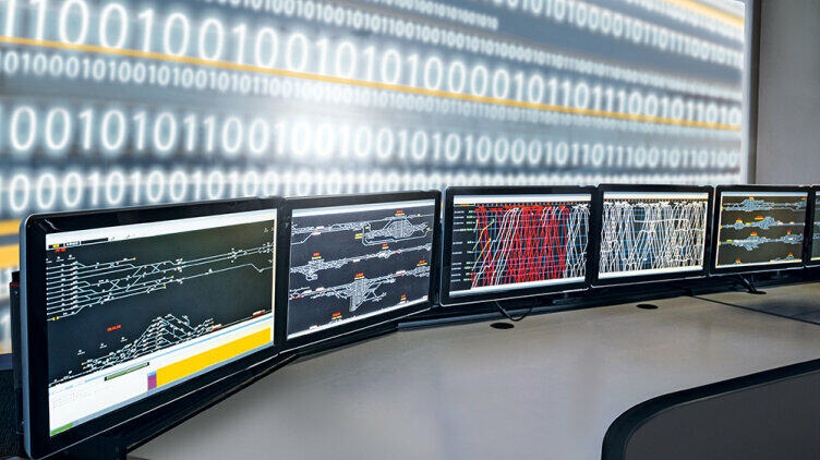 Five monitors on a desk