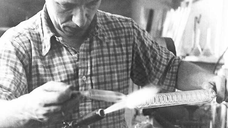 Man with a Bunsen burner